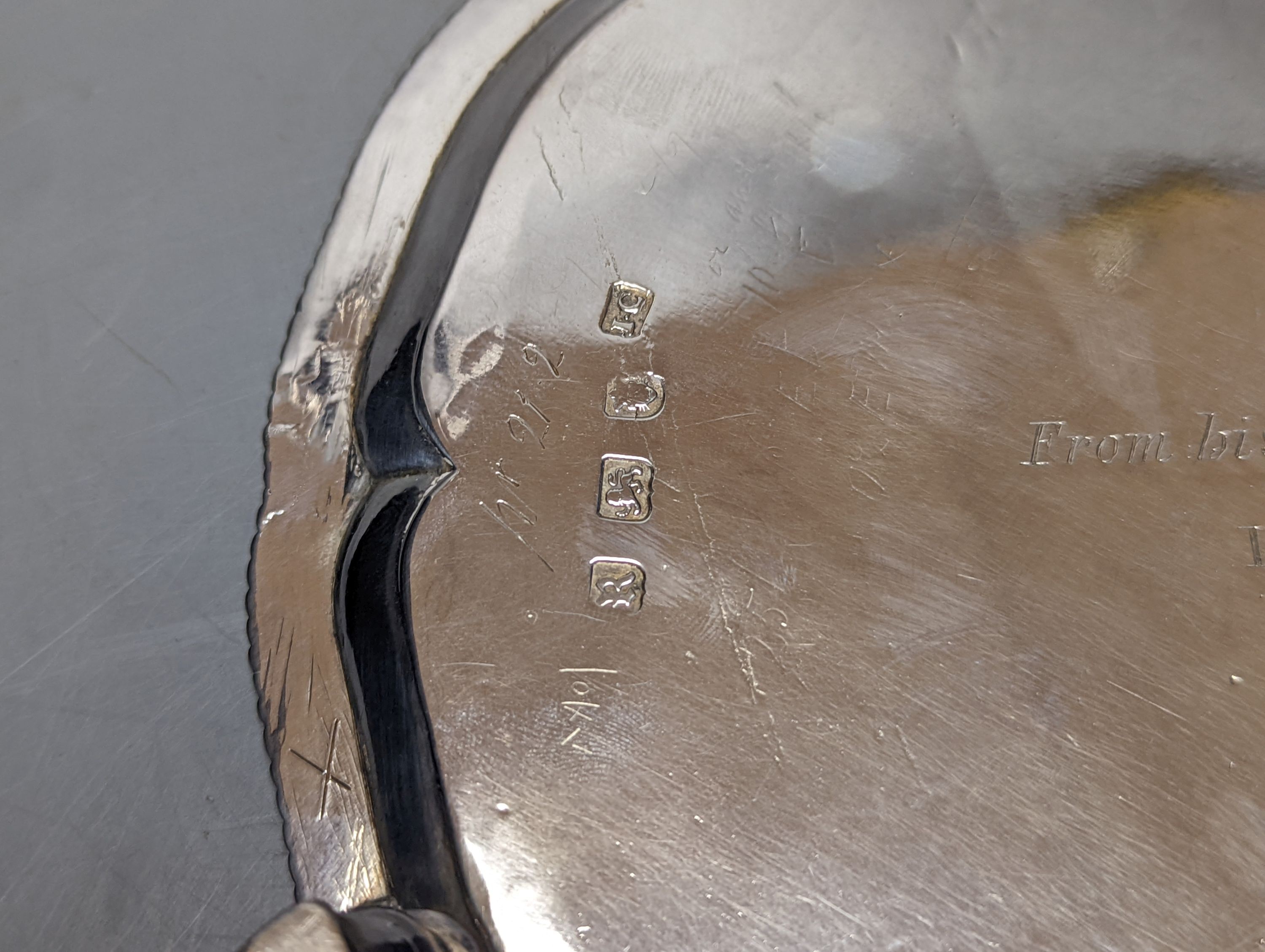 A George III silver waiter, John Cox, London, 1772, with later inscription to base, 18cm